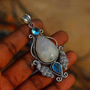 Pendentif pierre de lune et topaze bleue en argent oxydé